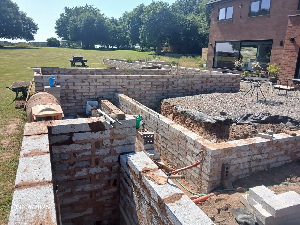 Large Raised Planters & Steps Forming Patio Area - Image 1